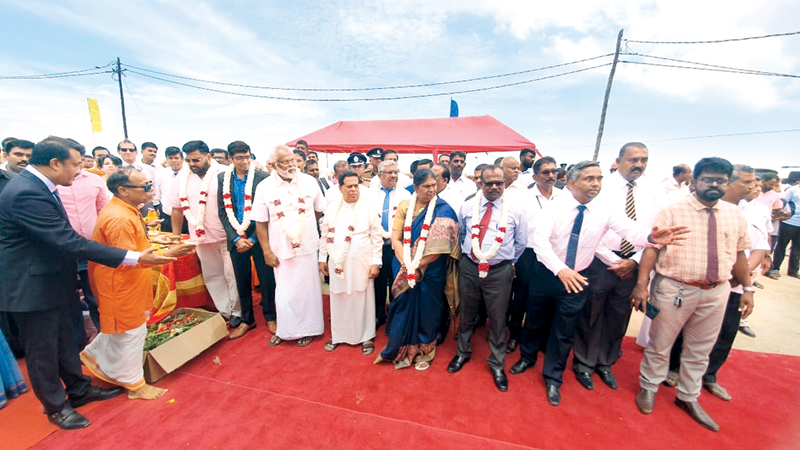 Ports and Shipping Minister Nimal Siripala de Silva, Fisheries Minister Douglas Devanandaand guests at KKS
