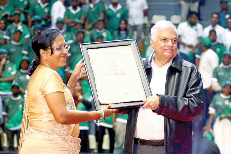 Archieved edition of the Siyarata newspaper being presented to the President by its Editor Mrs.Maya Kalubowila