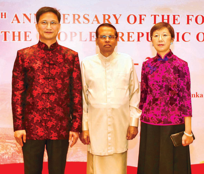 Former President Maithripala Sirisena with Chinese Ambassador to Sri Lanka Qi Zhenhong and Ms Qi
