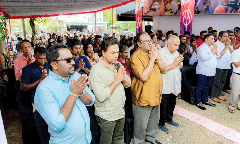 Kalutara District SLPP Parliamentarian Sanjeeva Edirimanna opened a new coordination office in Horana recently. Here State Minister of Fisheries Piyal Nishantha, SLPP General Secretary Sagara Kariyawasam, SLPP Parliamentarians Gamini Lokuge, Sarath Weerasekera, Lalith Warnakumara, Sumith Udukumbura and Tissa Kuttiarachchi participating in religious observances at the opening of the office.