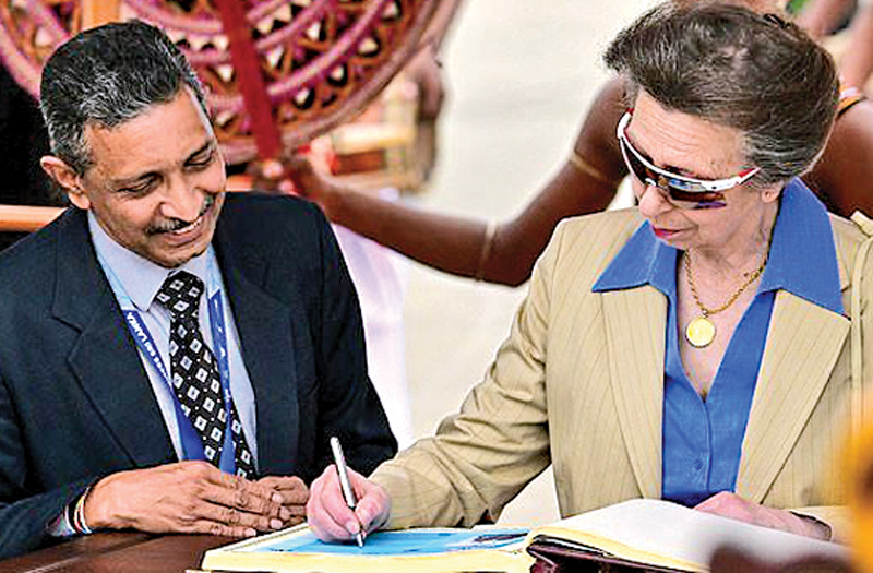 Princess Anne, Princess Royal signs the golden book after she arrives for a three-day official visit to Sri Lanka at the BIA in Katunayake