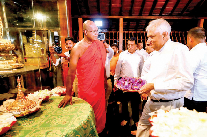 President Ranil Wickremesinghe participates in Vesak religious ceremonies at the Gangaramaya, Colombo with Ven. Dr. Kirinde Assaji Thera
