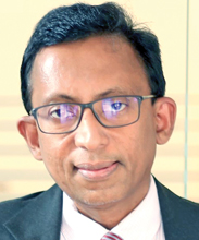 Dr. Lakkumar Fernando