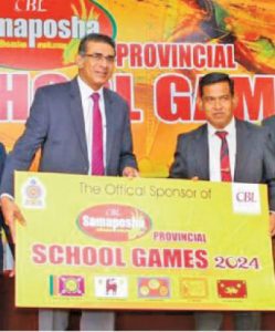 Manjula Dahanayake (left) Director and Chief Executive Officer of CBL Foods and Athula Wijewardena, Education Director Sports, Health, Physical Education of the Ministry of Education with the sponsorship (Pic by Wimal Karunathilaka)
