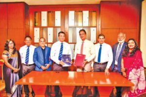 CA Sri Lanka and AAT Sri Lanka officials after the signing.