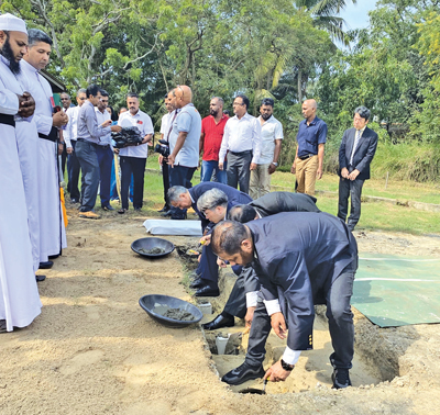 The Japan International Cooperation Agency, in partnership with the Department of Meteorology laying the foundation stone to construct an eleven-storey tower to establish a Doppler Weather Radar Network in Puttalam. 