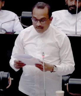 Minister Bimal Rathnayake tabling the Commission Report in Parliamen